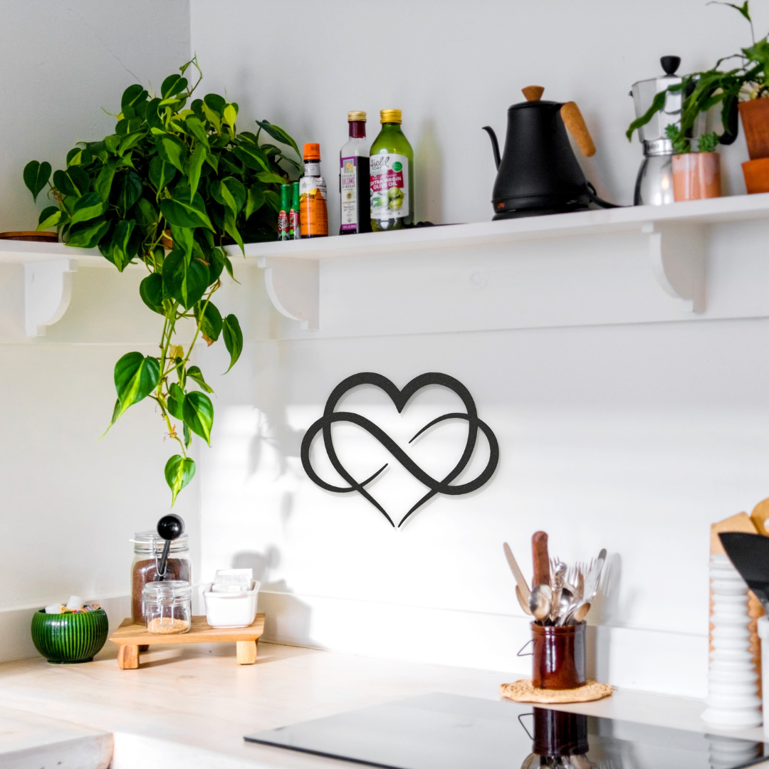black infinity heart metal wall art on wall in kitchen