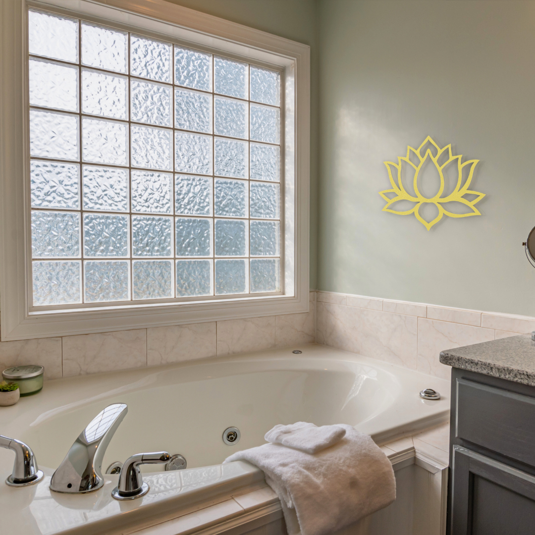 golden boho lotus flower metal wall art on wall in bathroom