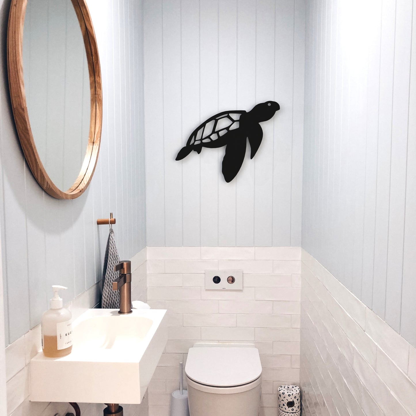 black-sea-turtle-metal-wall-art-on-wall-in-modern-toilet