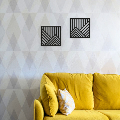 black geometric mountains metal wall art on a wall in living room