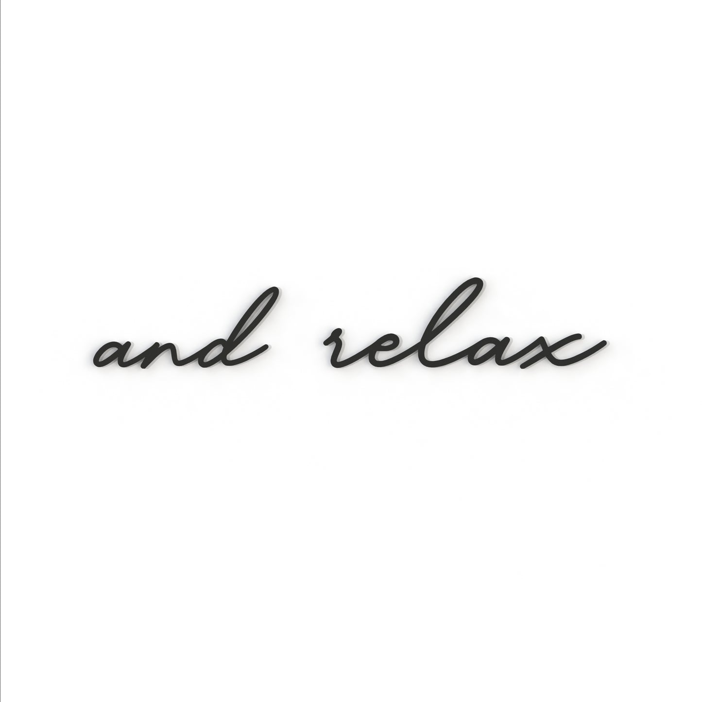 black and relax metal sign hangs on a white background