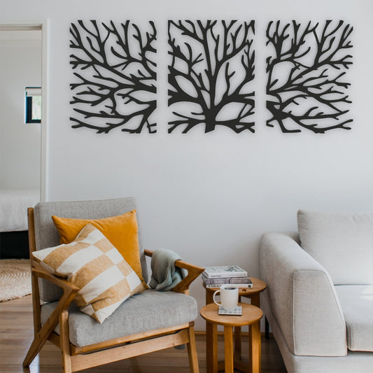 black metal tree branches set of 3 metal wall art on wall in living room