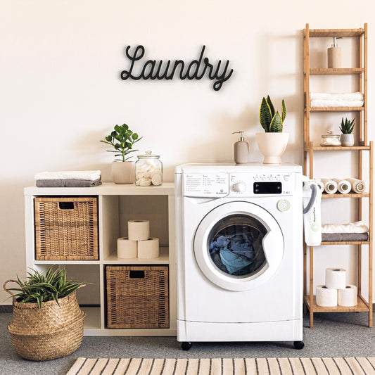 black-laundry-metal-sign-on-wall-in-utility-room