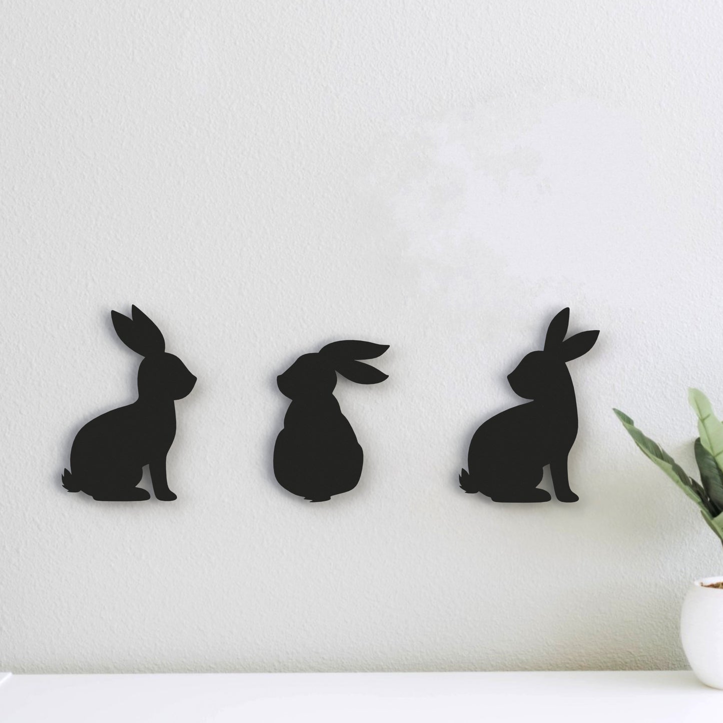 black-bunny-trio-metal-wall-art-above-desk