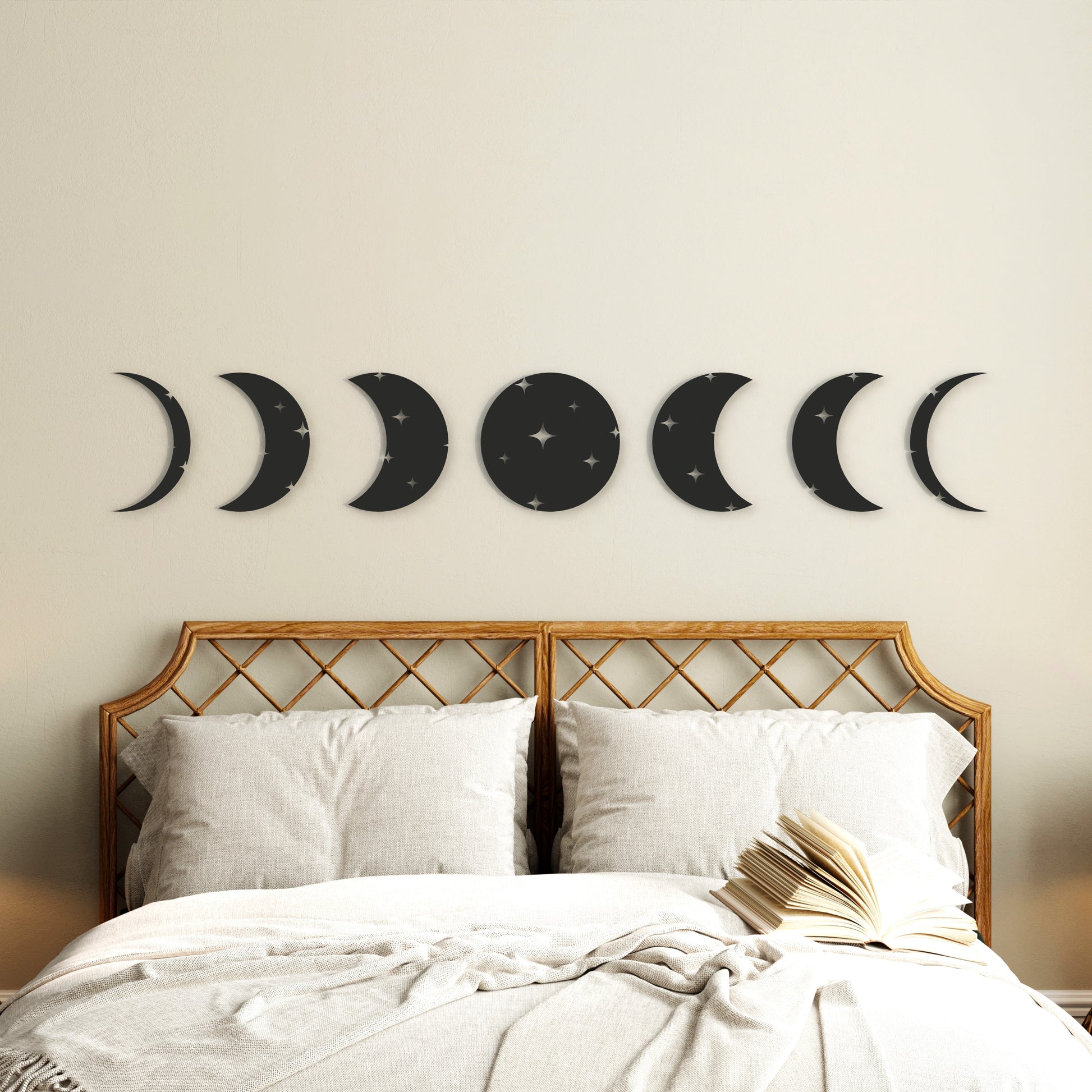 seven-moonphases-black-metal-wall-art-on-wall-in-bedroom