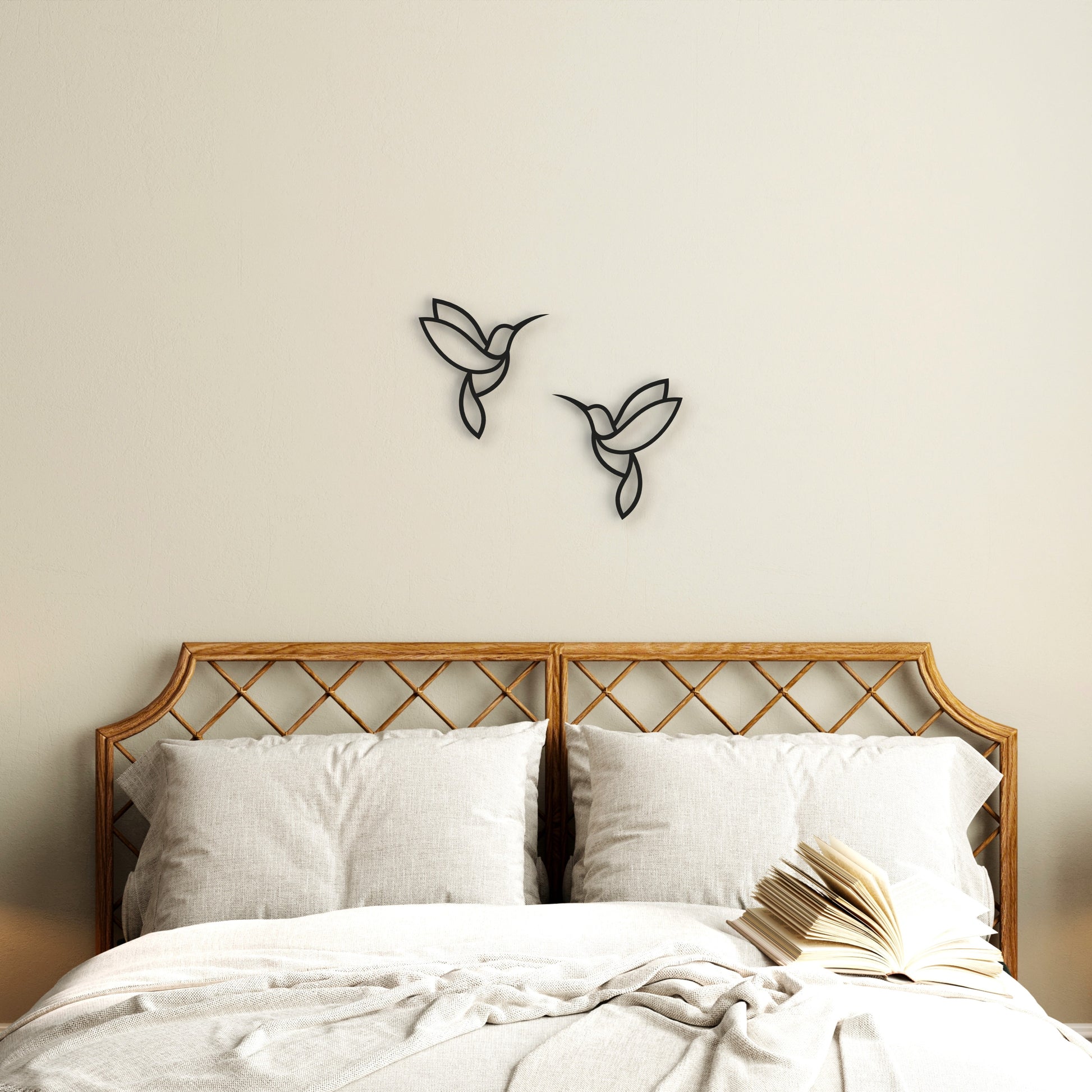 black-minimalist-hummingbirds-metal-wall-art-on-wall-in-bedroom