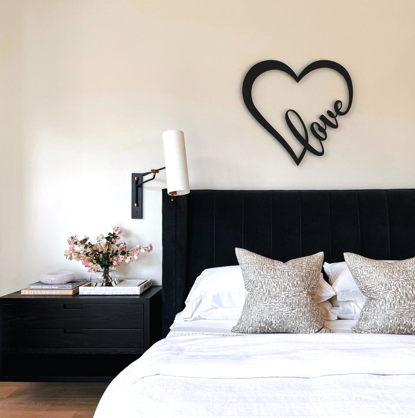 black-love-heart-metal-wall-art-on-wall-in-bedroom