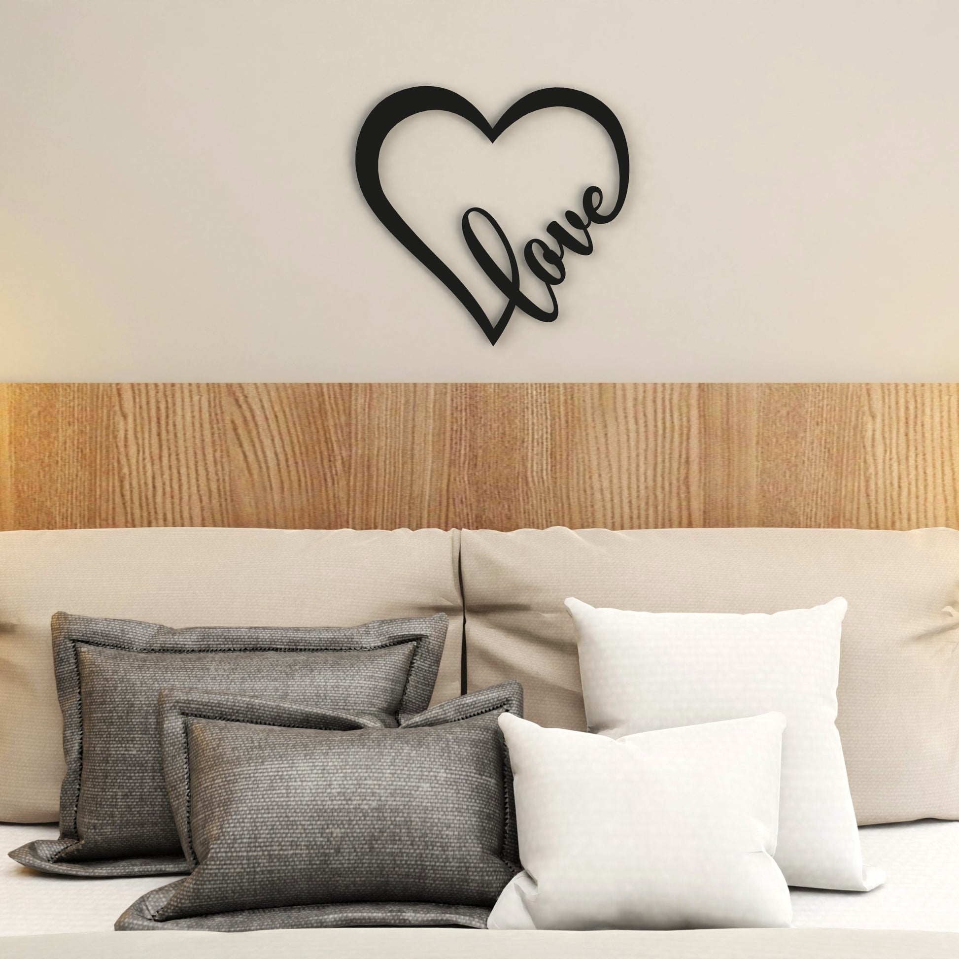 black-love-heart-metal-wall-art-on-wall-in-modern-bedroom