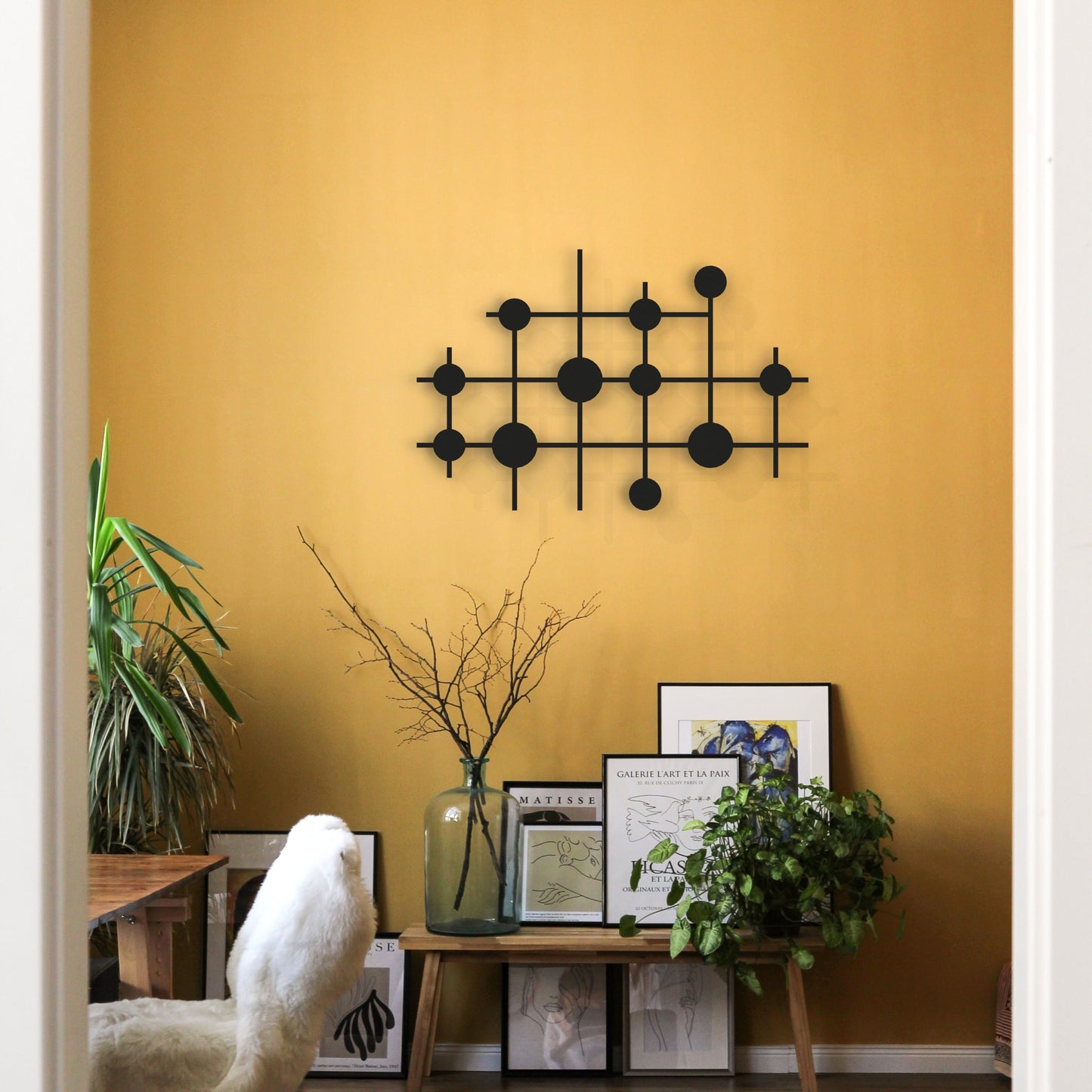 black-metal-wall-art-abstract-lines-and-circles-on-wall-in-office-room